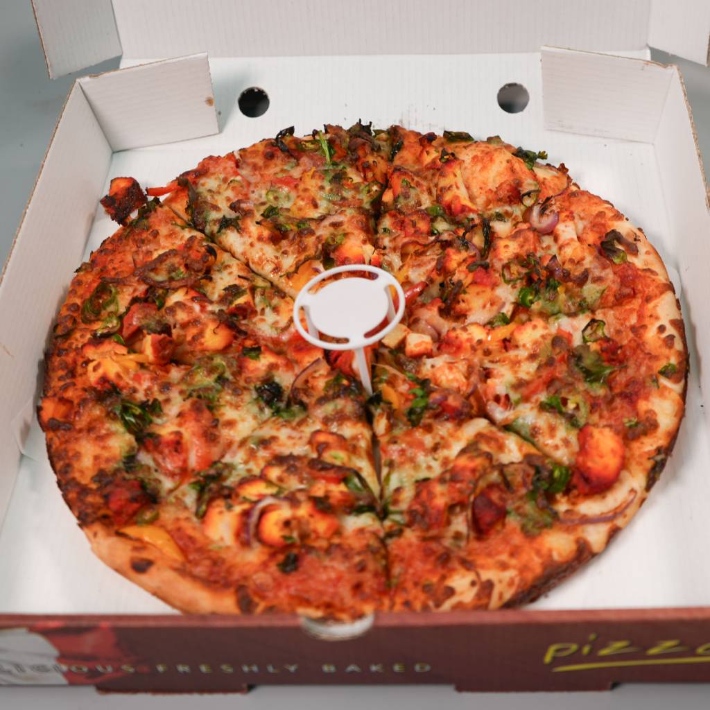 freshly baked pizzas served at Paprikas Nicos Johnstone for delivery or pick up.