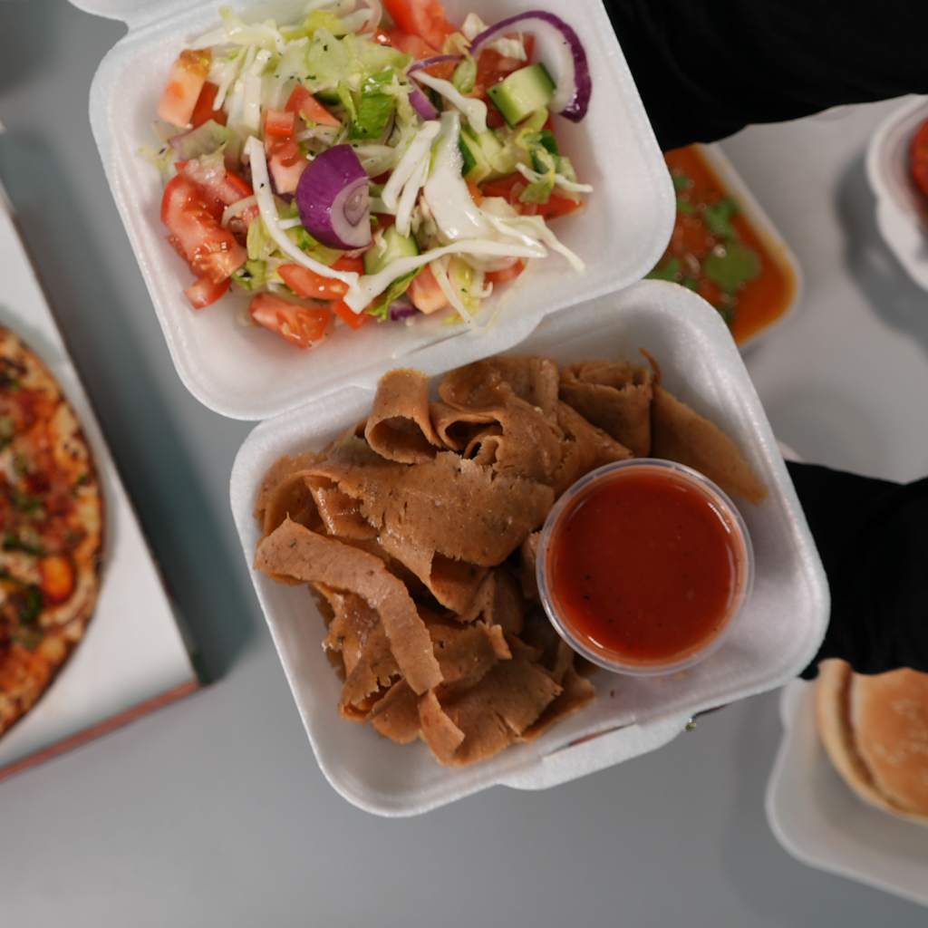 Juicy Turkish Kebabs served with a salad and sauce at Paprikas Nicos takeaway in Johnstone